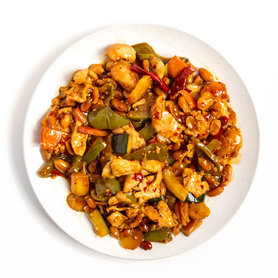 Kung Pao Chicken from Cherry Village Asian Grill, with chicken, peanuts, and vegetables in sauce.